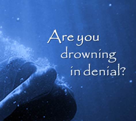 Girl underwater; with the words "Are you drowning in denial?"
